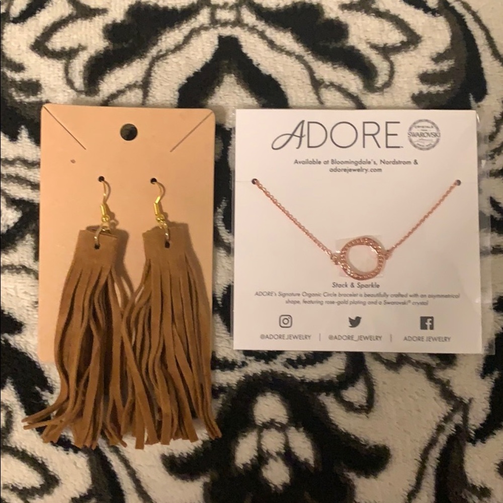Leather tassel earrings and circle bracelet.